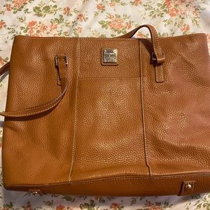 Mahogany colored Dooney and Bourke Sling Bag